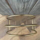 Vintage 1970s brass magazine rack, Mid-Century openwork architectural style.