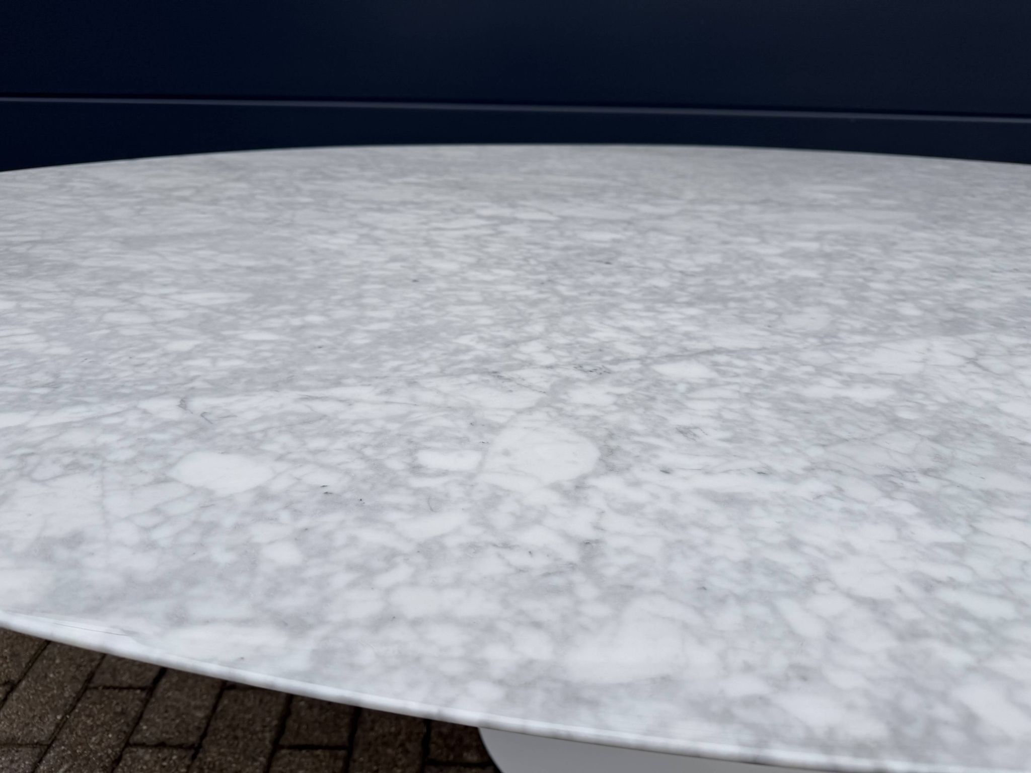 Original Knoll Tulip oval dining table (244cm) in Carrara marble.