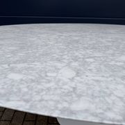 Original Knoll Tulip oval dining table (244cm) in Carrara marble.