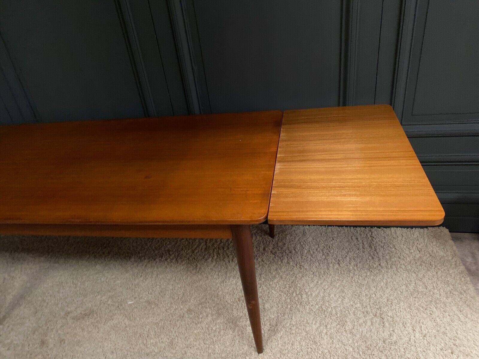 Scandinavian rectangular teak dining table with 4 tapered legs