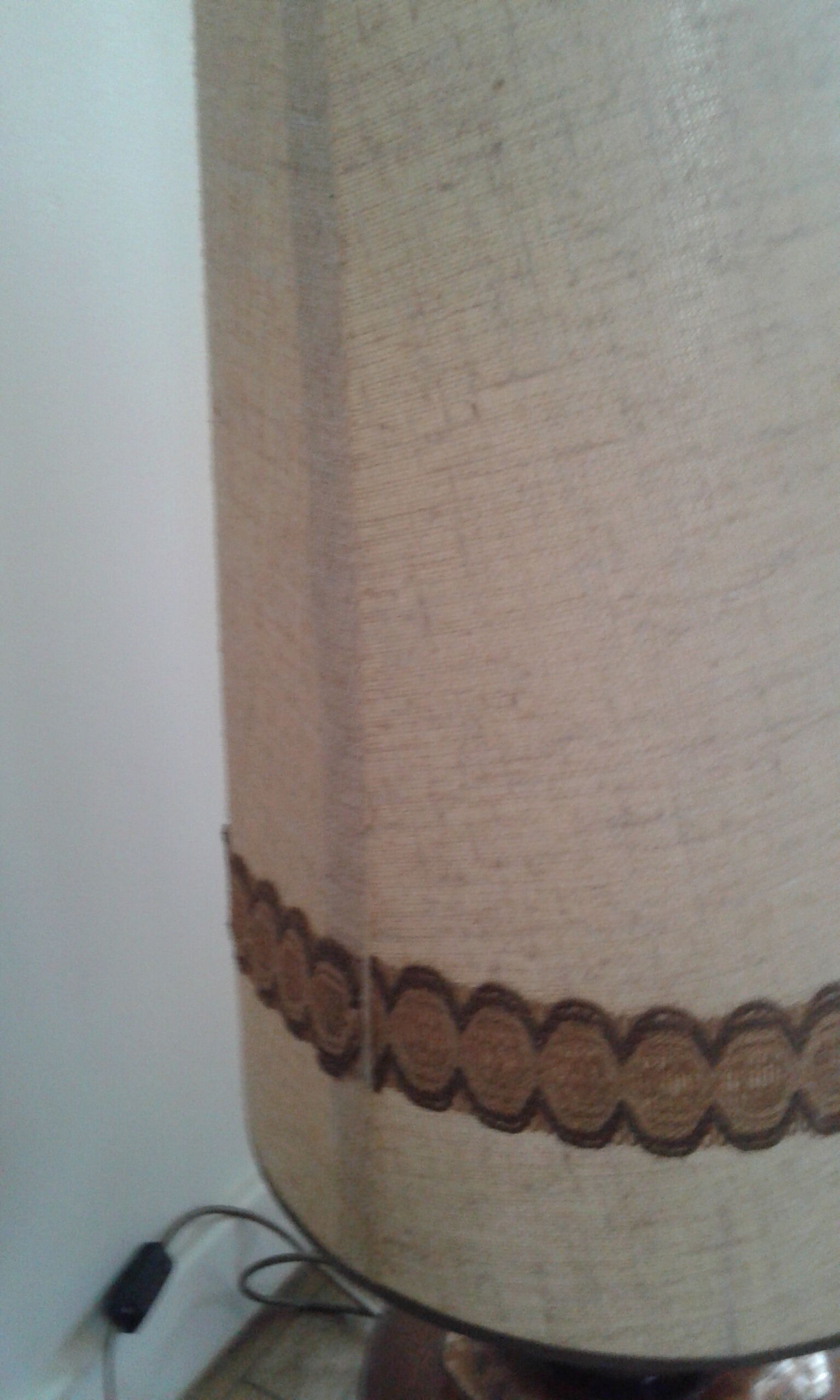 Floor lamp with Fat Lava ceramic foot and fabric lampshade.