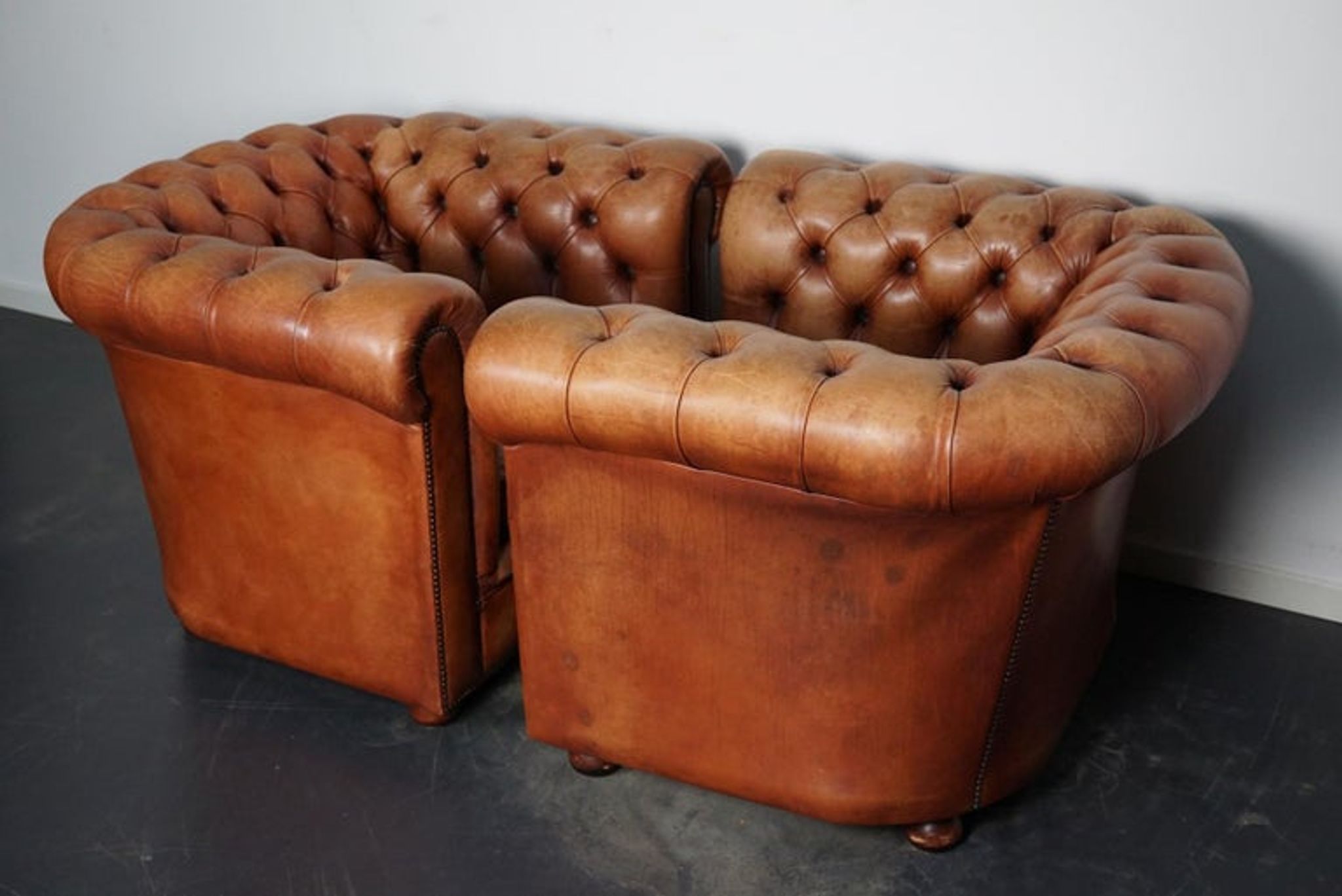 Set of 2 vintage chesterfield club armchairs in cognac leather, Netherlands,