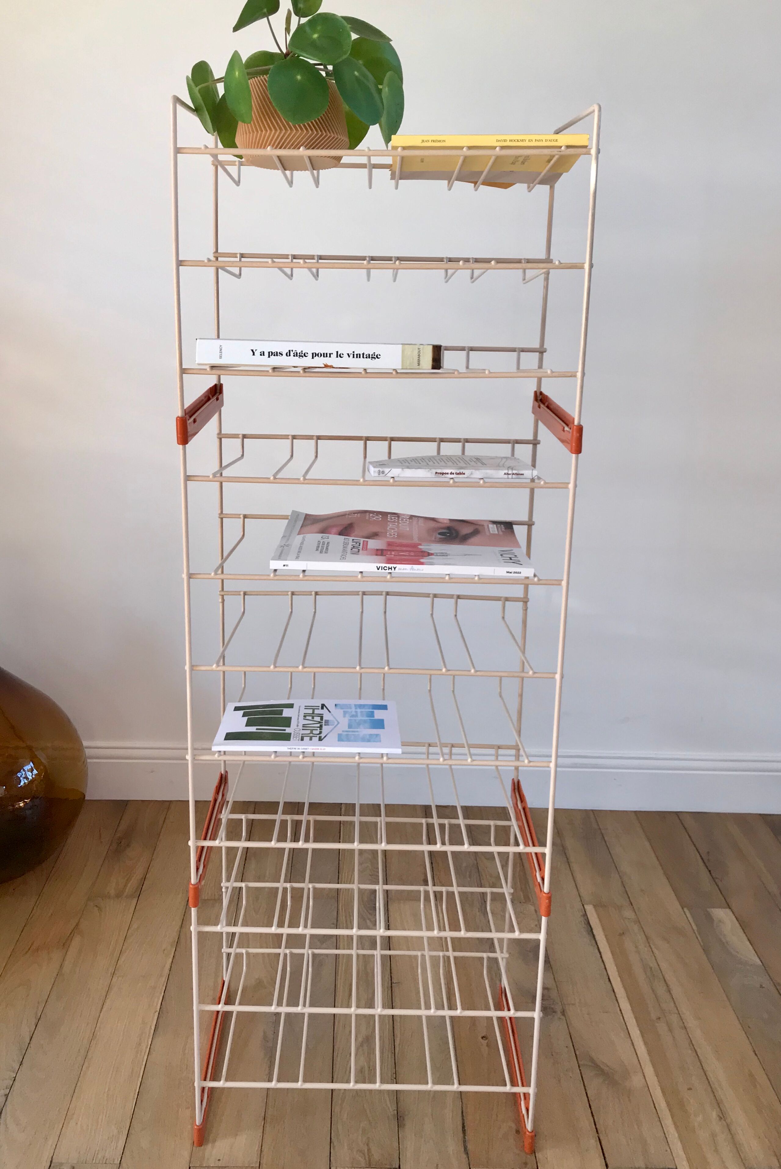 White and orange industrial shelf brand "caddie" 50s