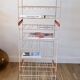 White and orange industrial shelf brand "caddie" 50s