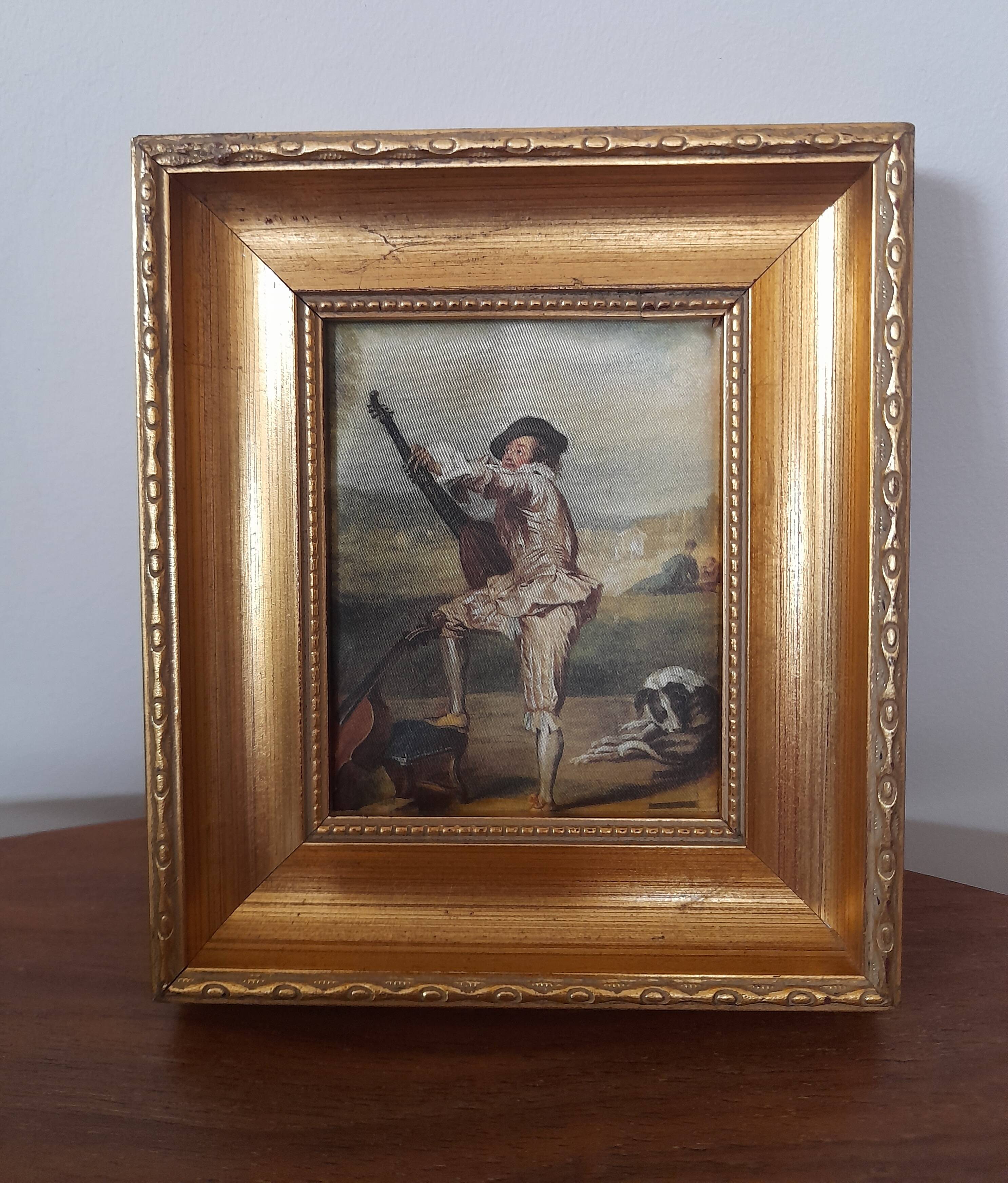Old golden frame "lute player" on silk