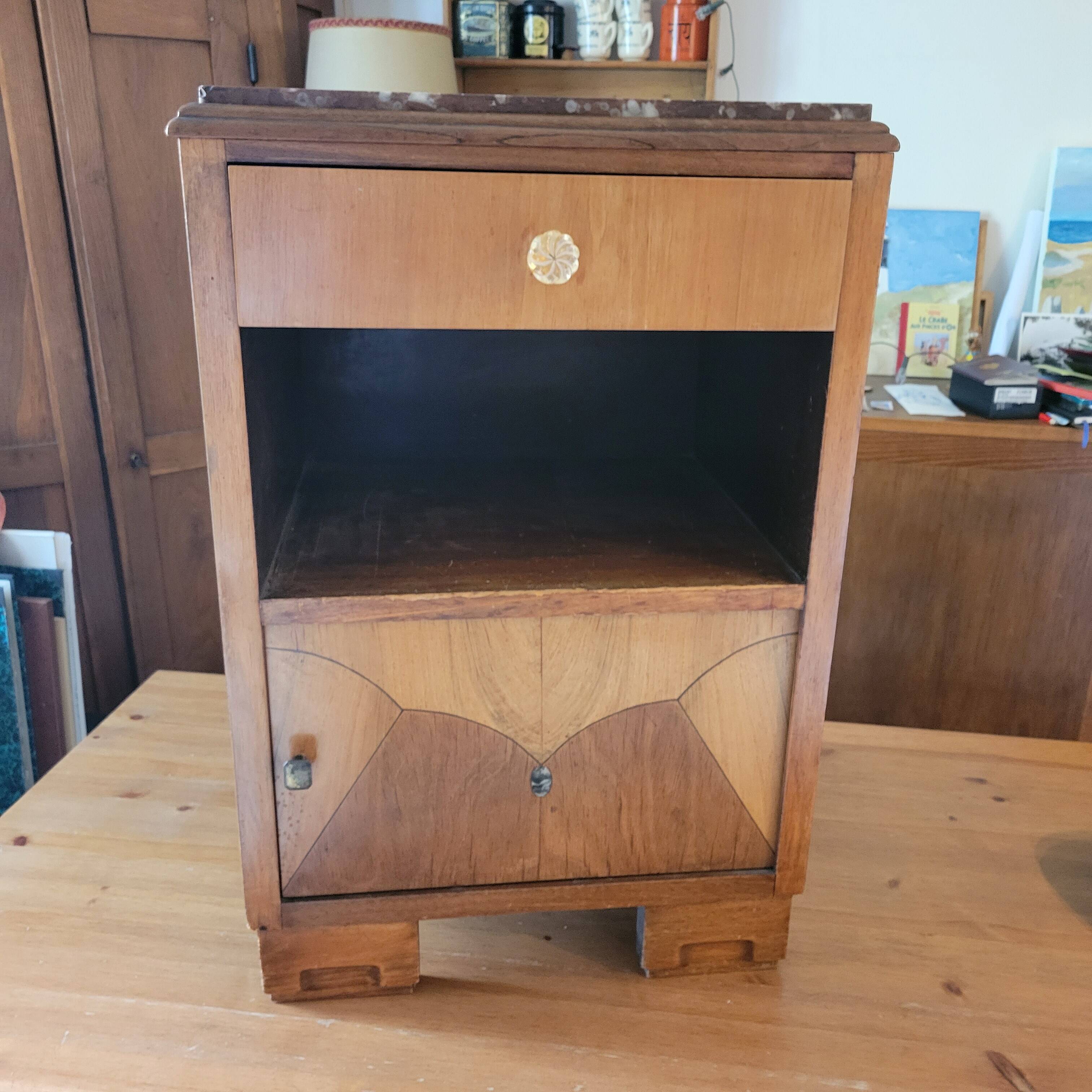 Art Deco bedside table with marble tops.