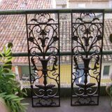 Pair of wrought iron door grilles from Dammarie