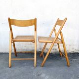 Pair of folding chairs with cane seat