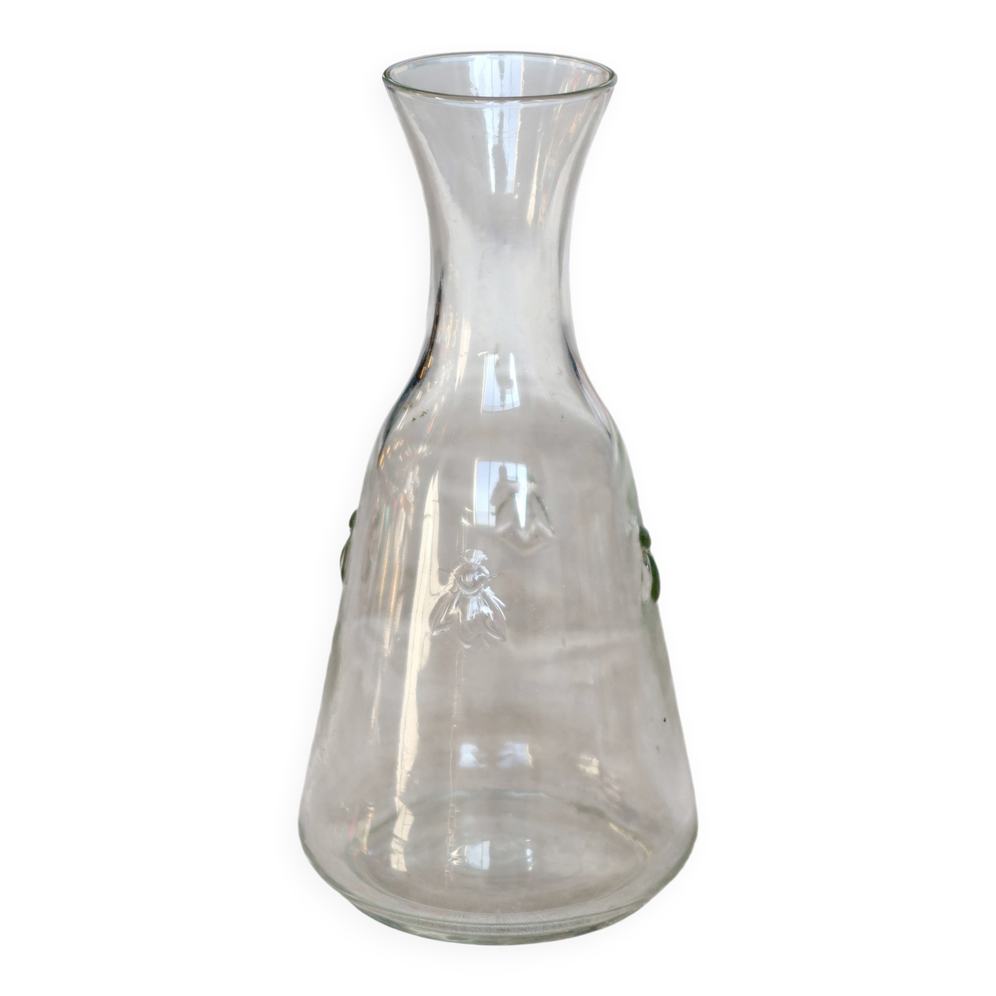 Vintage glass carafe with embossed bee motifs