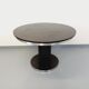 Vintage dining table in melamine with a black wood effect and chrome metal.
