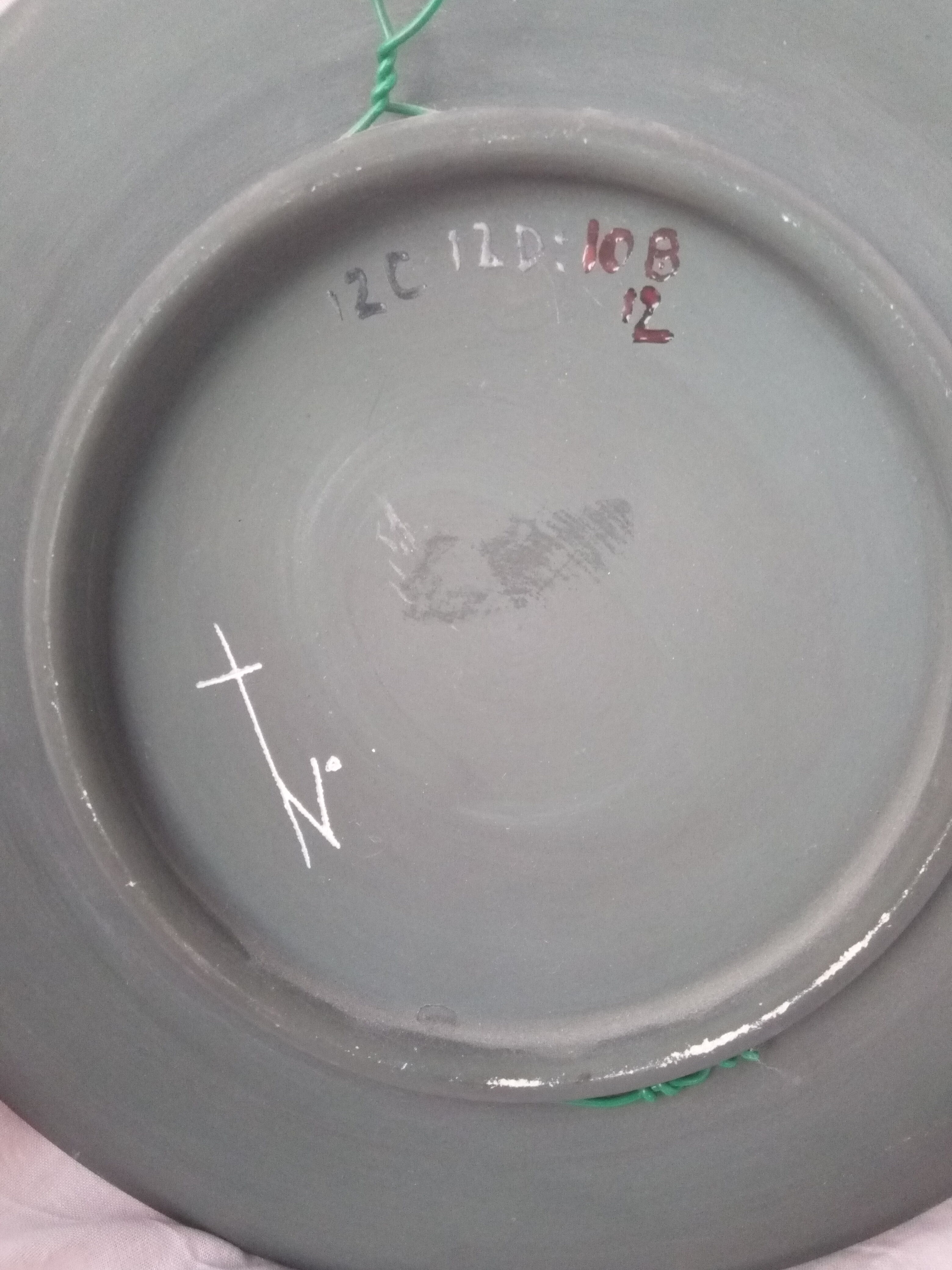 Rare pair of ceramic plates and enamel with mythological decoration. The 50s.