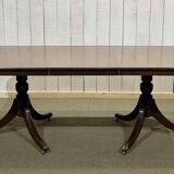 1950s English Regency walnut table with 1 extension leaf