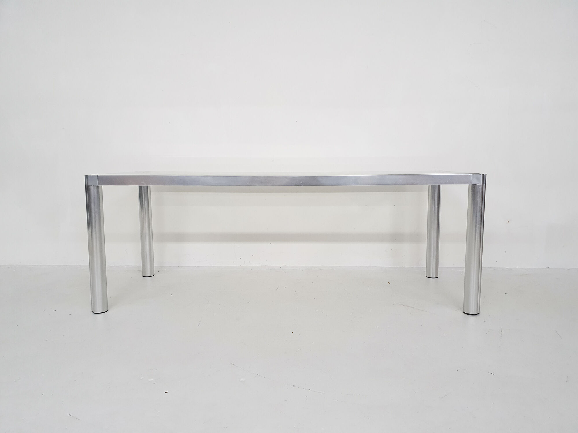 Glass and aluminum dining table by kho liang ie, the netherlands 1974