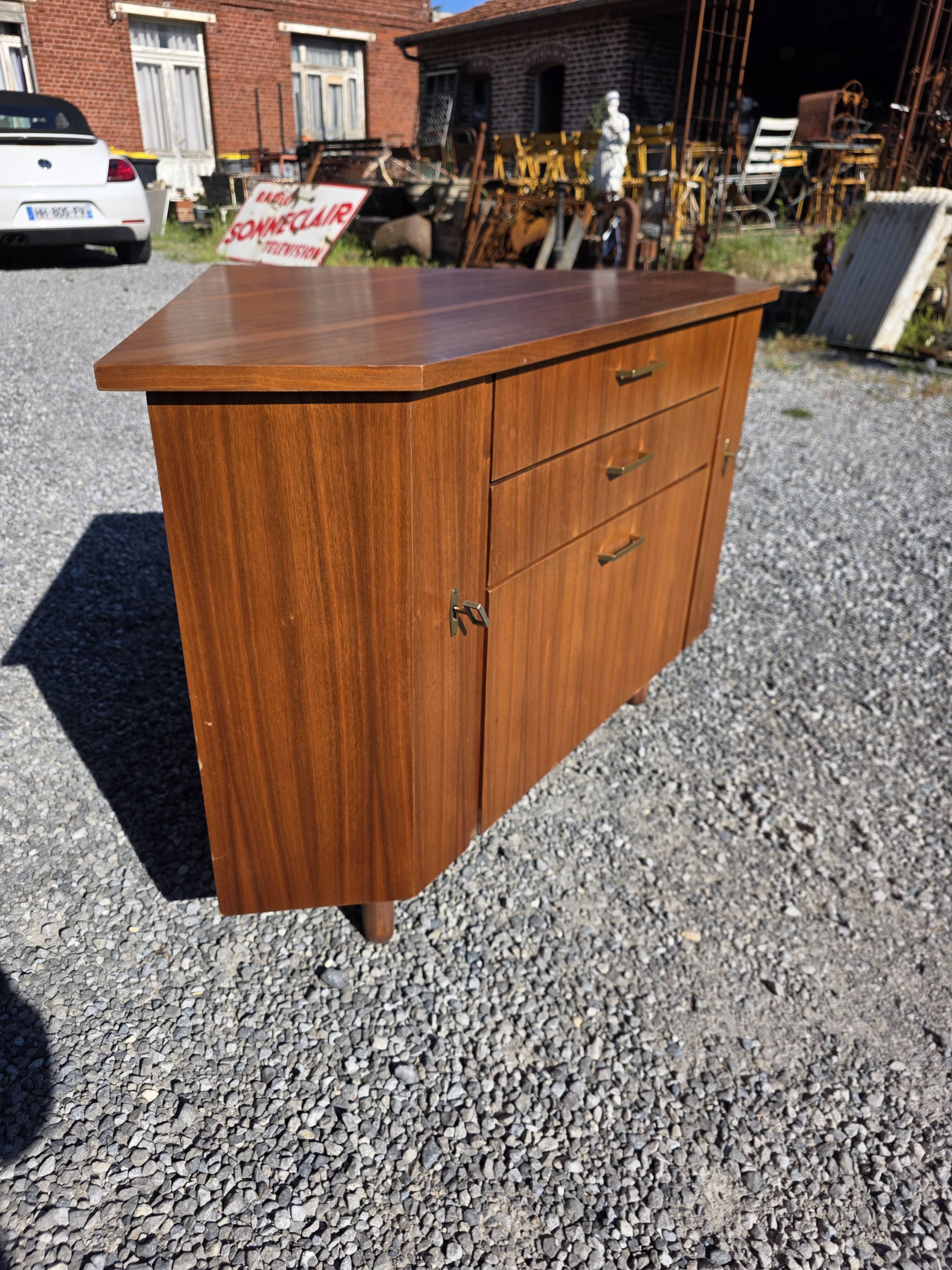 Scandinavian corner unit in teak from the 1960s.