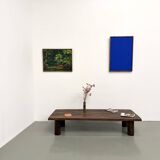 Modernist coffee table in solid elm, cylindrical pine base, 1970s.