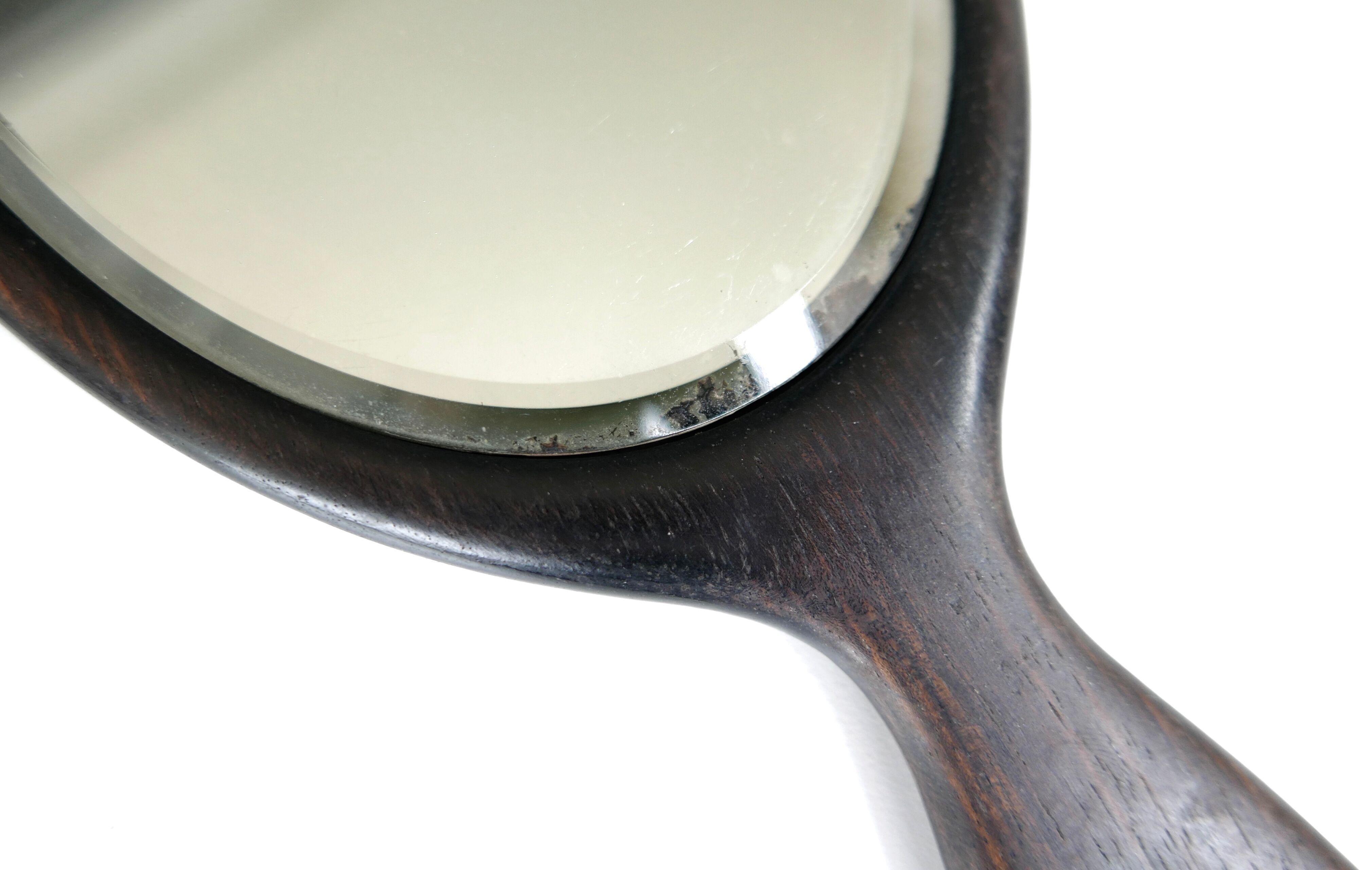 Napoleon III bevelled hand mirror in ebony, 30.5 x 13 cm