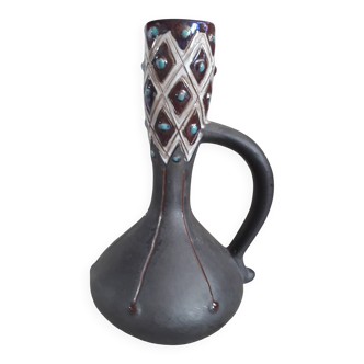 Vintage ceramic vase in ethnic style