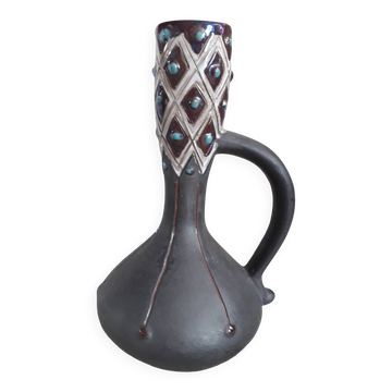 Vintage ceramic vase in ethnic style