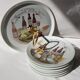 Porcelain cheese platter with 6 matching plates.