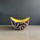 Yellow and black ceramic aperitif bowl, free form, West Germany.