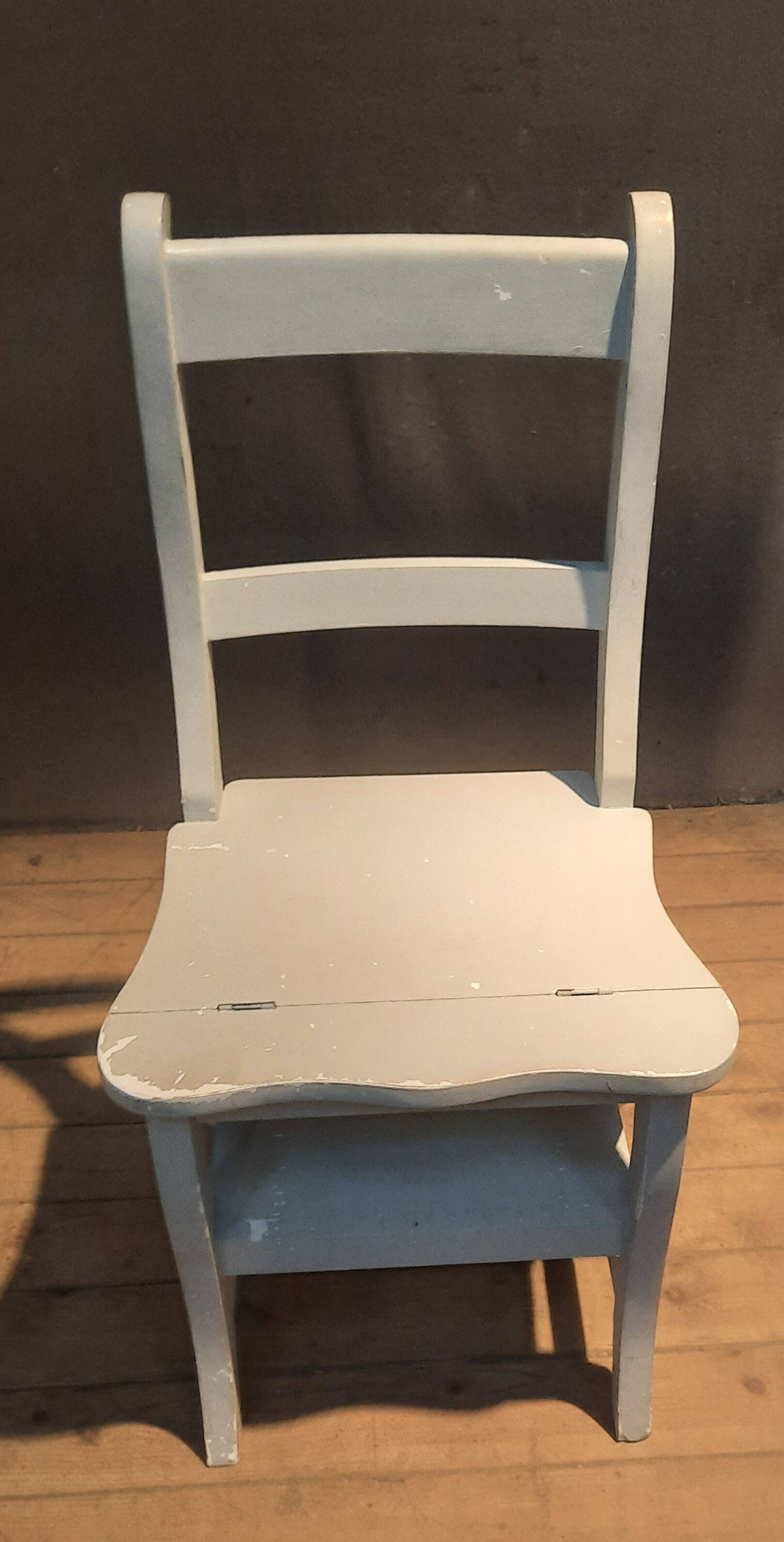 White chair convertible into a staircase.