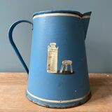 Old pitcher or milk jug in painted sheet metal