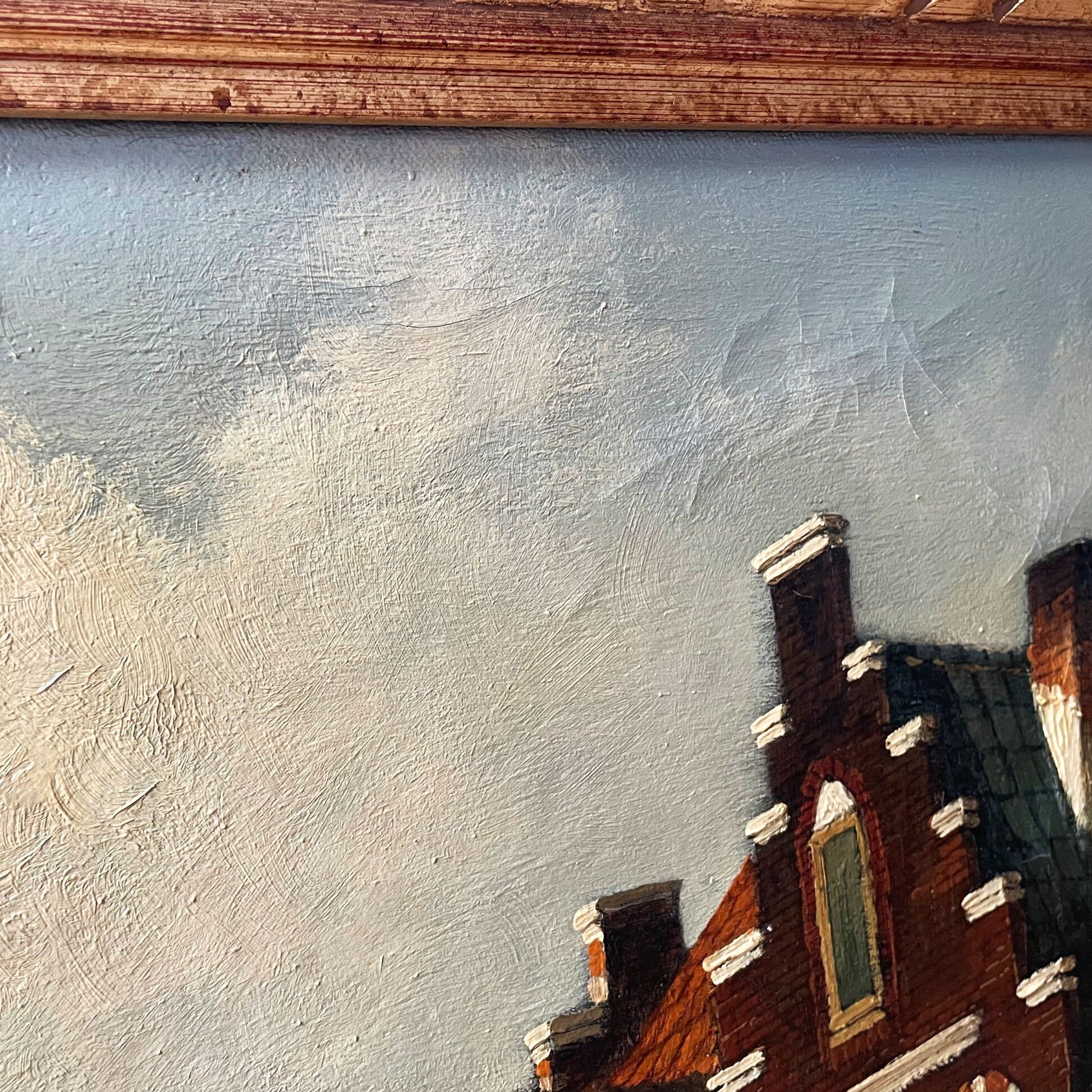 Dutch street scene oil painting in ornate frame signed Nijland