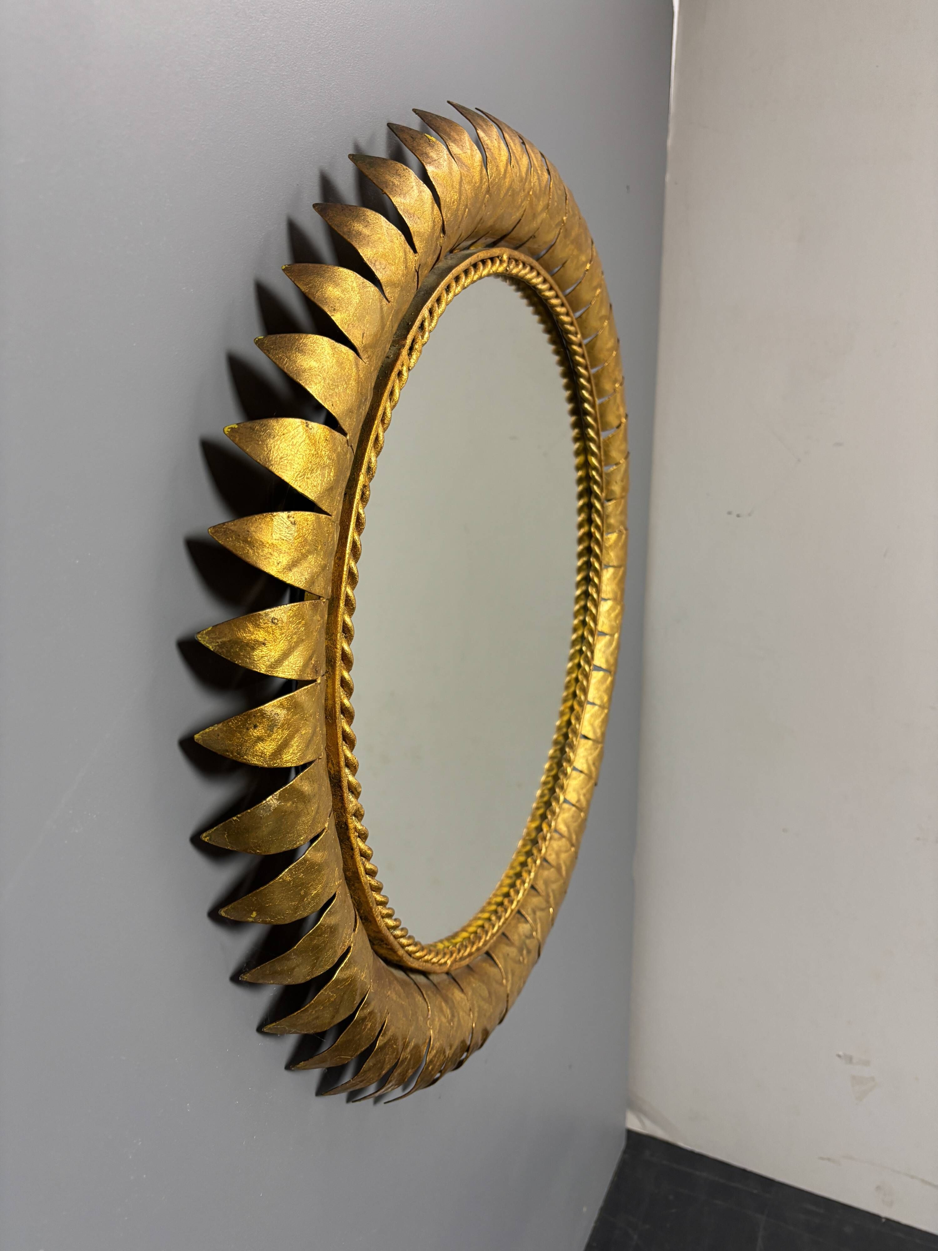 Midcentury bohemian Hollywood Regency Spanish gilt metal sun mirror, 1960s