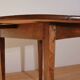 Round table in raw wood