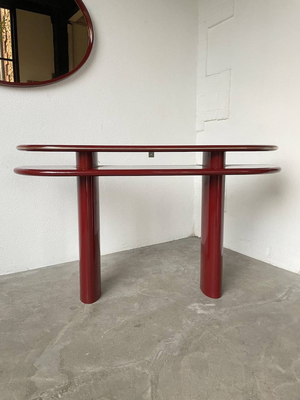 Red lacquered console and its mirror from the 80s