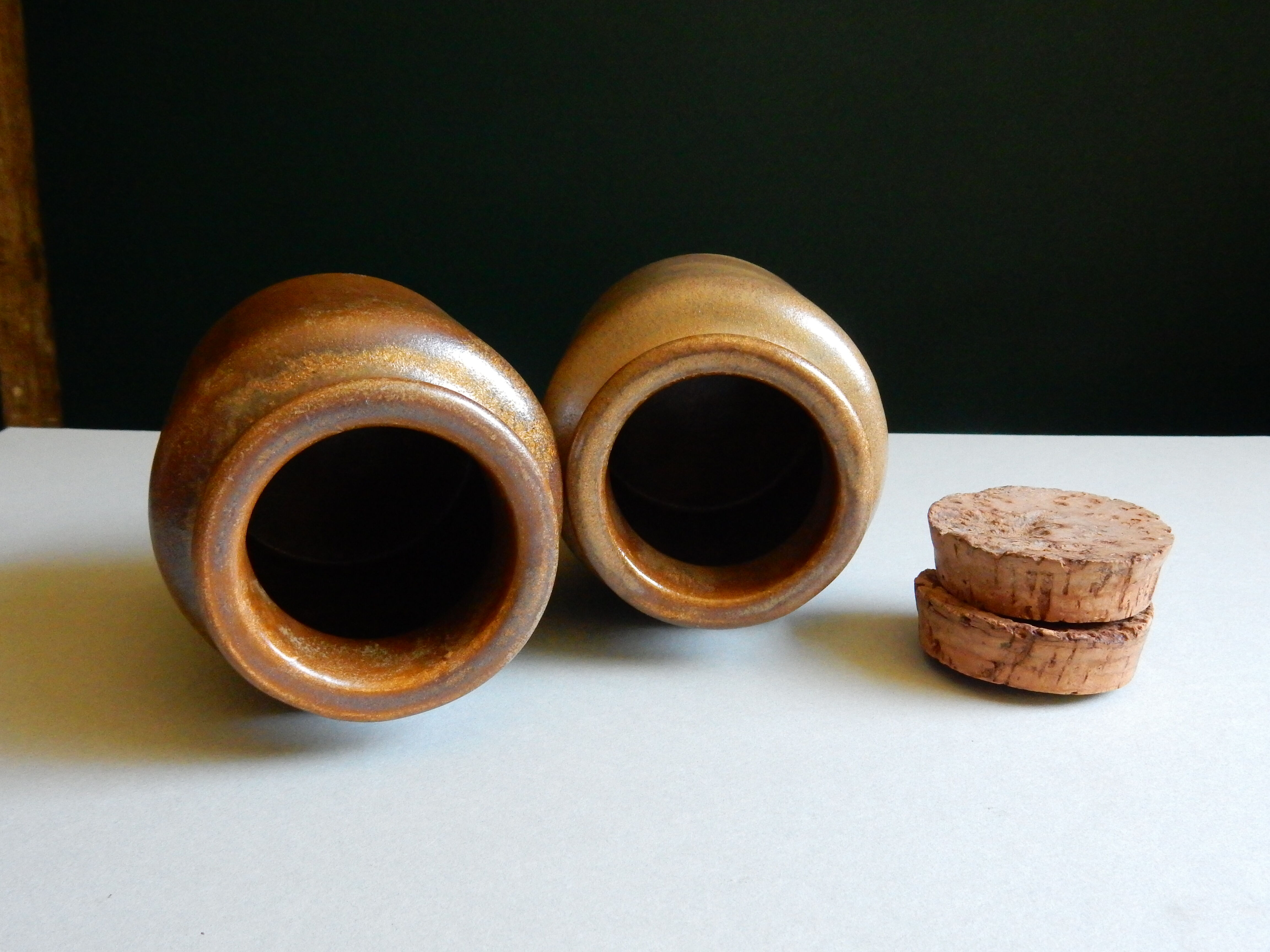 2 brown sandstone mustard pots