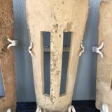 Lot of three terracotta and wrought iron appliques