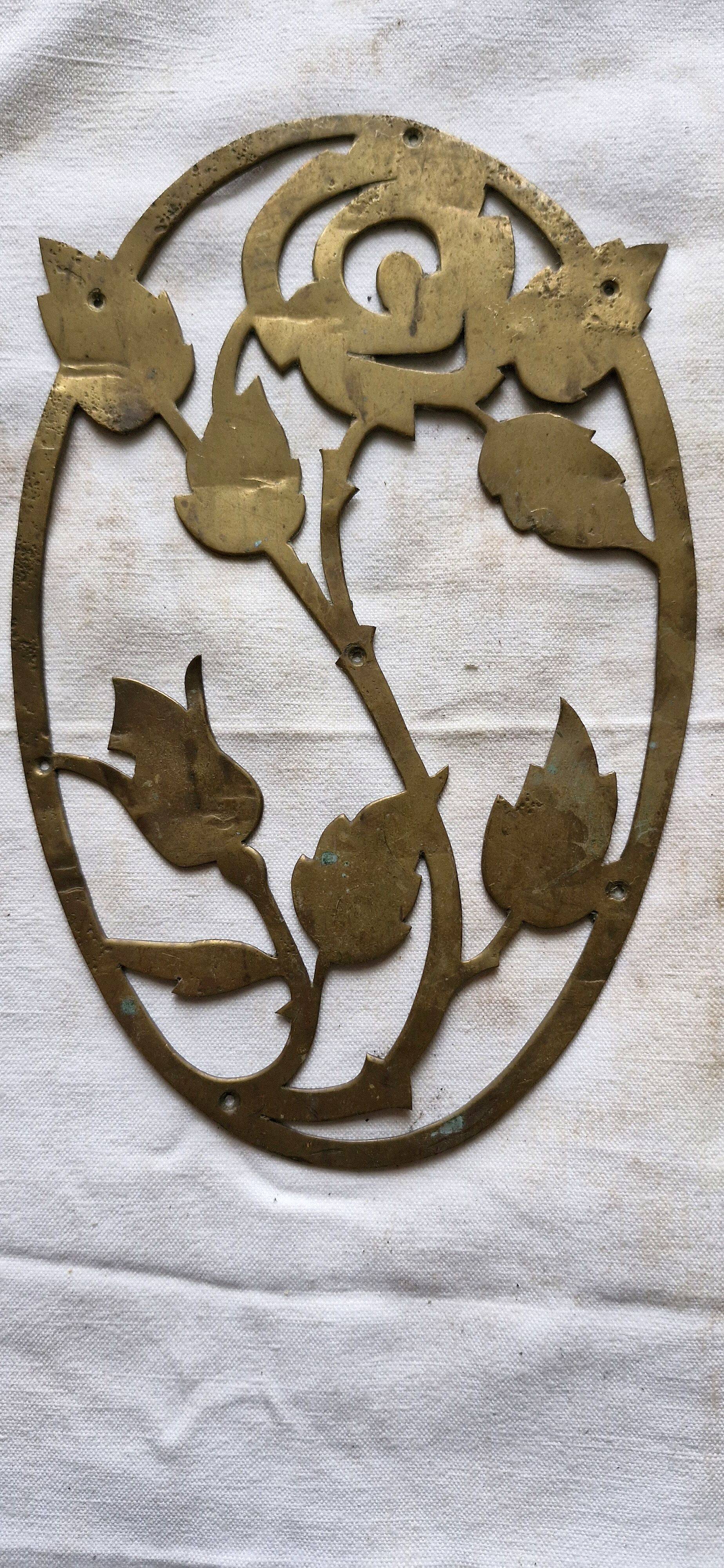 Old small oval brass rose window, width, height 18cm.
