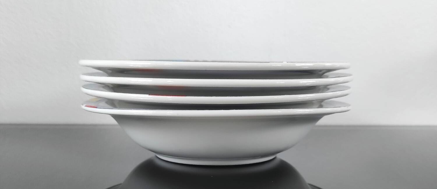 Set of 4 vintage Memphis style deep plates.