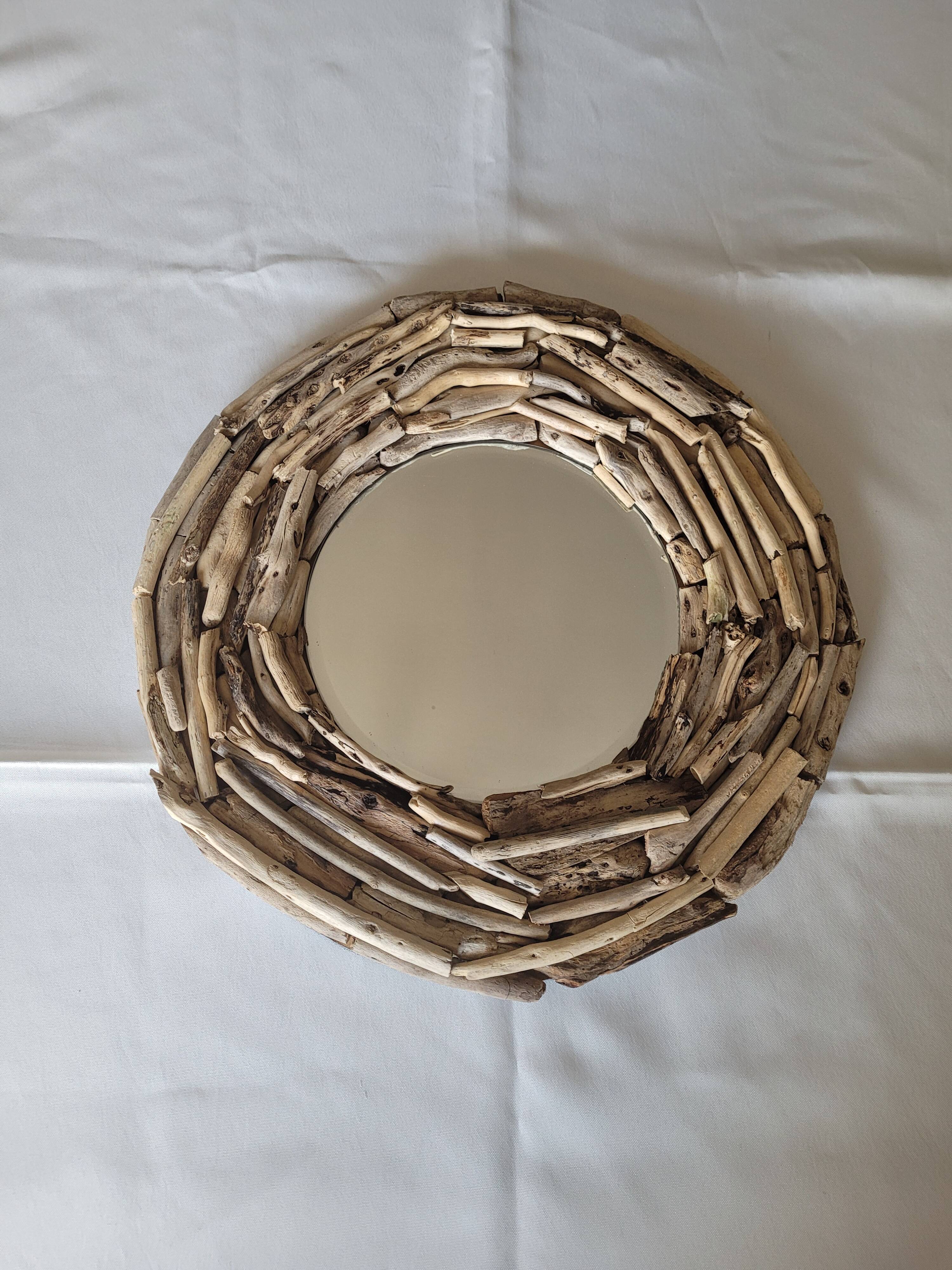 Very nice driftwood mirror.