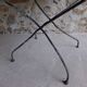 Ancienne table de jardin ronde en fer