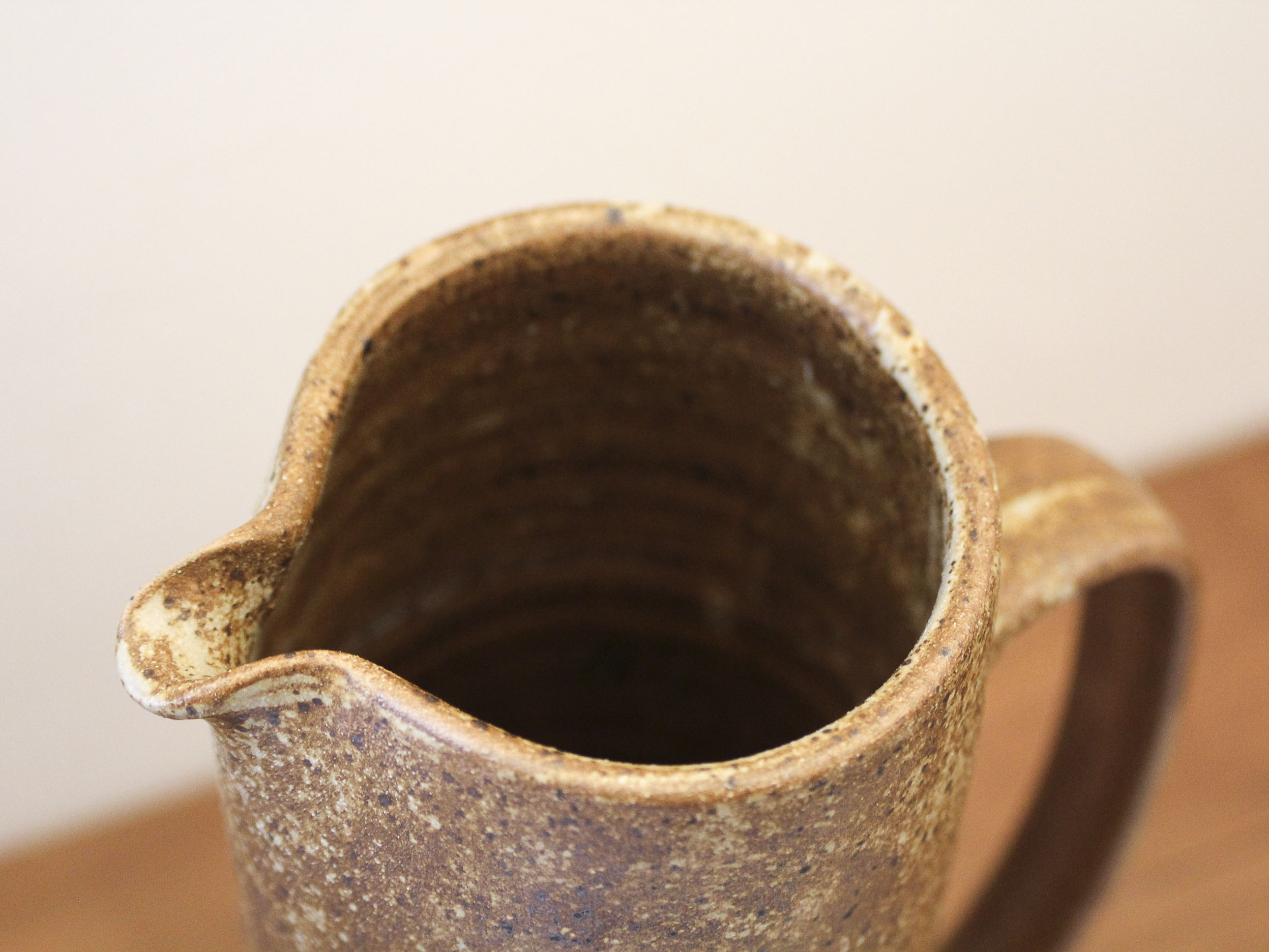 Pitcher in sandstone pyrity signed