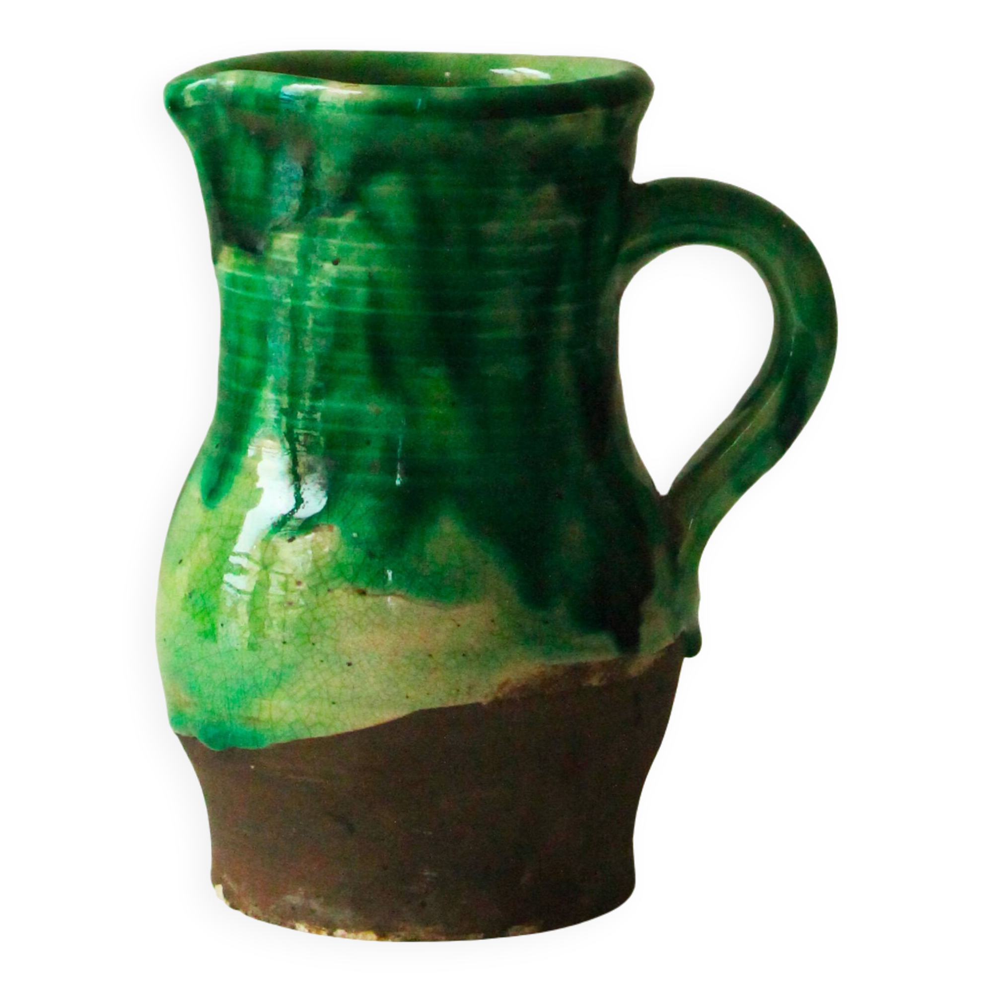 Glazed ceramic pitcher in green and brown by the potter Pierre Roulot.