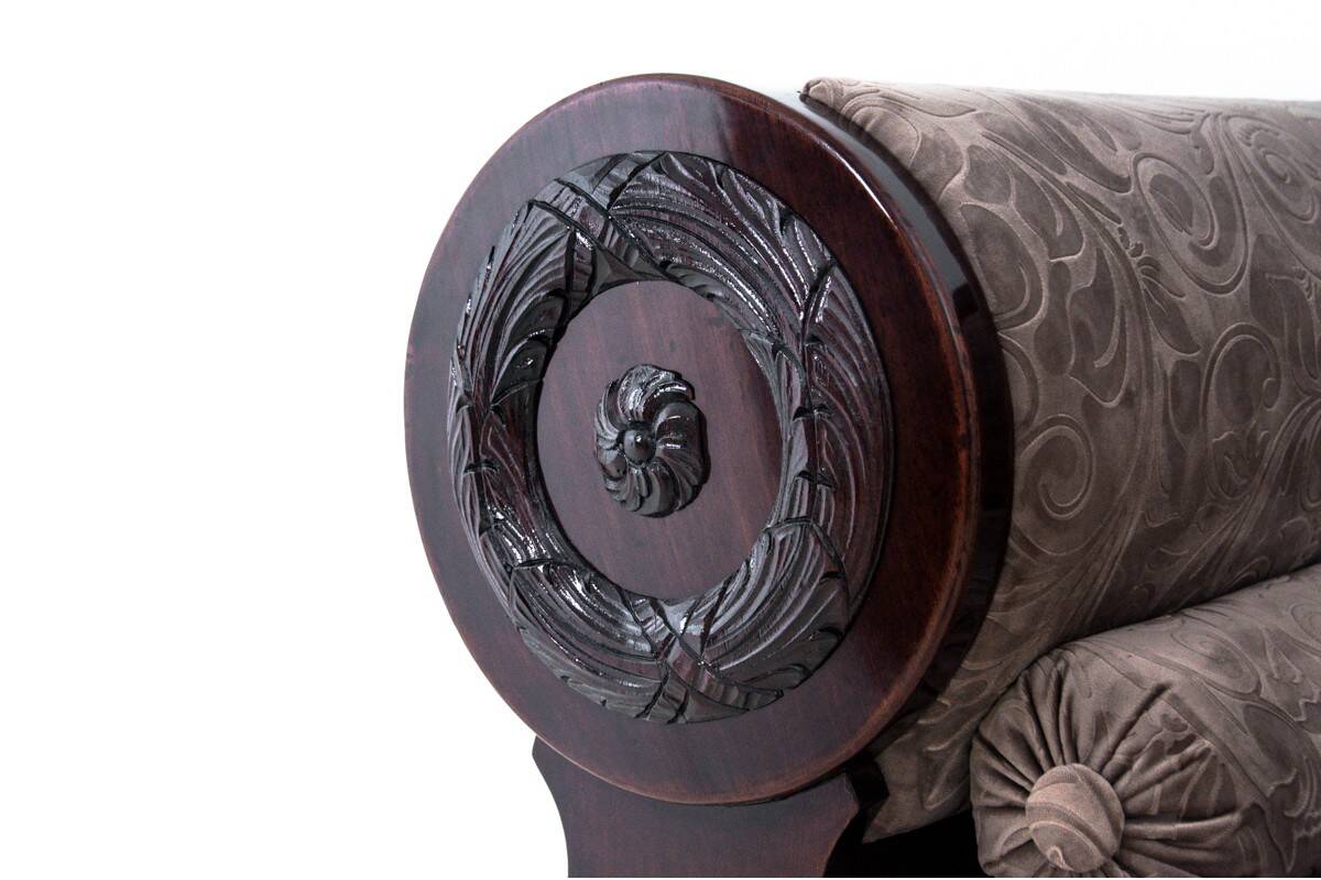 Antique sofa in Biedermeier style, Northern Europe, circa 1840.