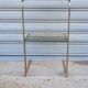 End table in gold metal and smoked glass