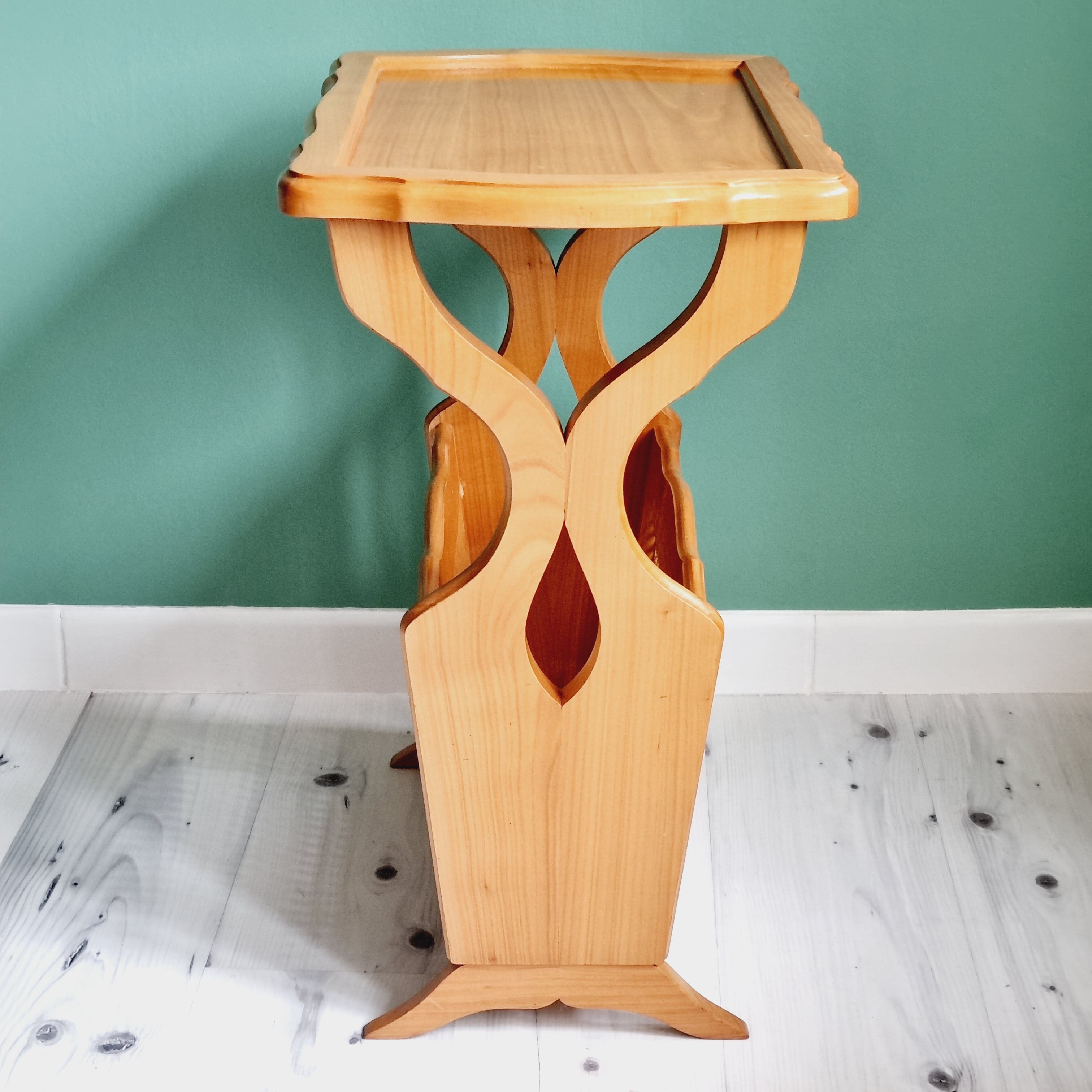 Side table with wooden and cane magazine holder