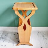 Side table with wooden and cane magazine holder
