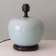 Celadon-colored cracked ceramic table lamp with new personalized lampshade.