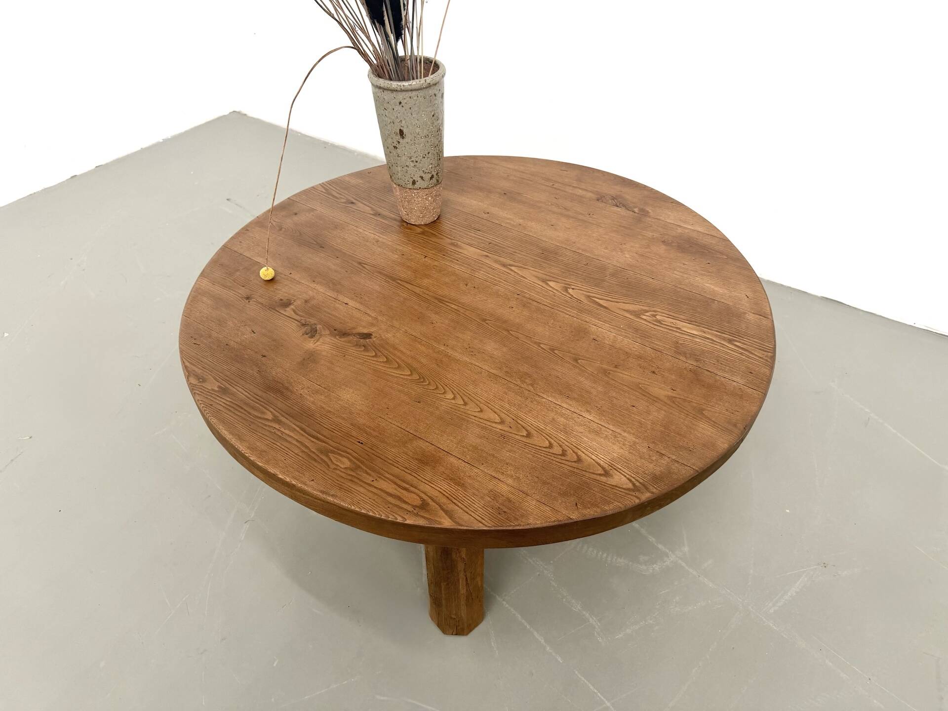 Round coffee table in solid oak, octagonal legs, France, 1950s.