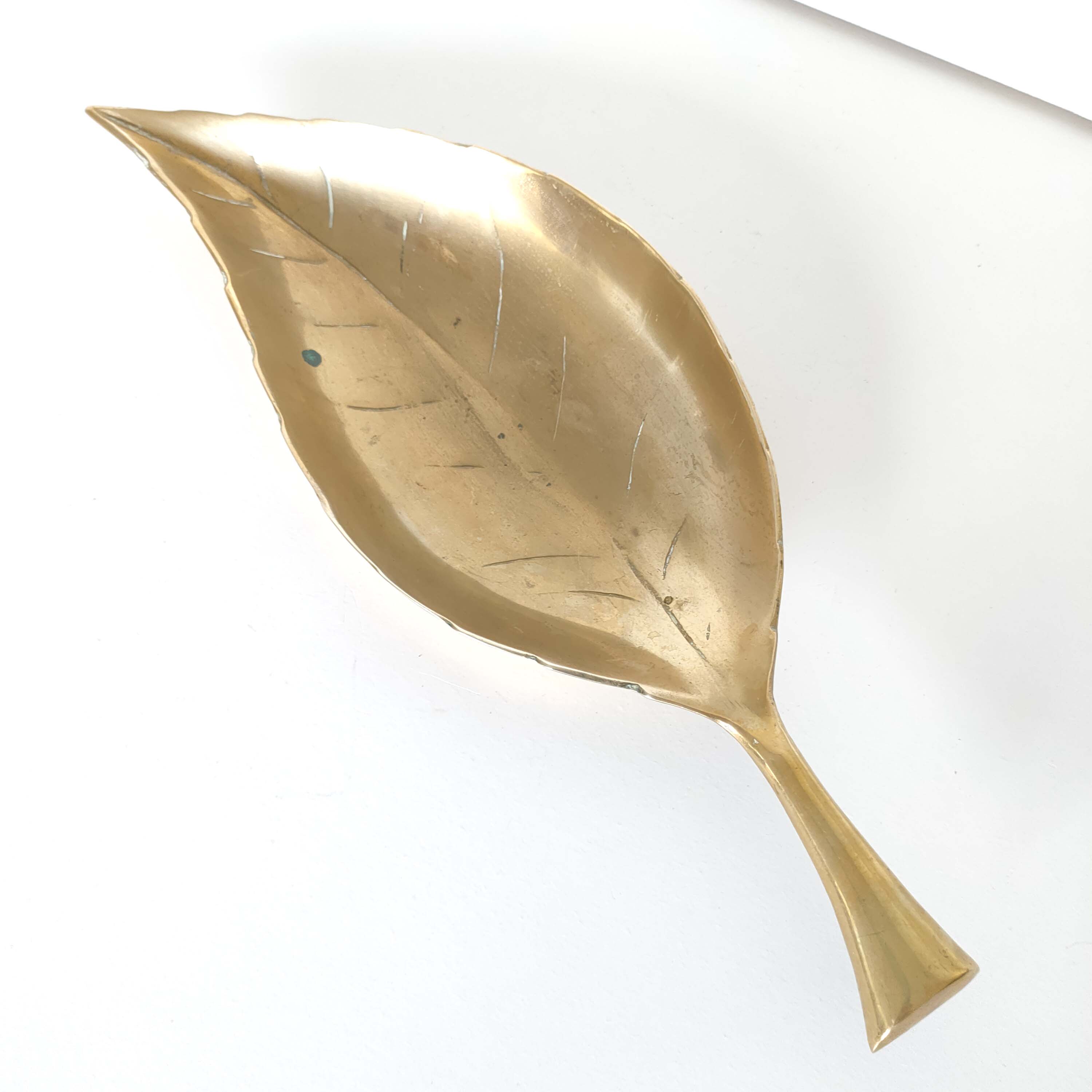 Empty brass leaf pocket