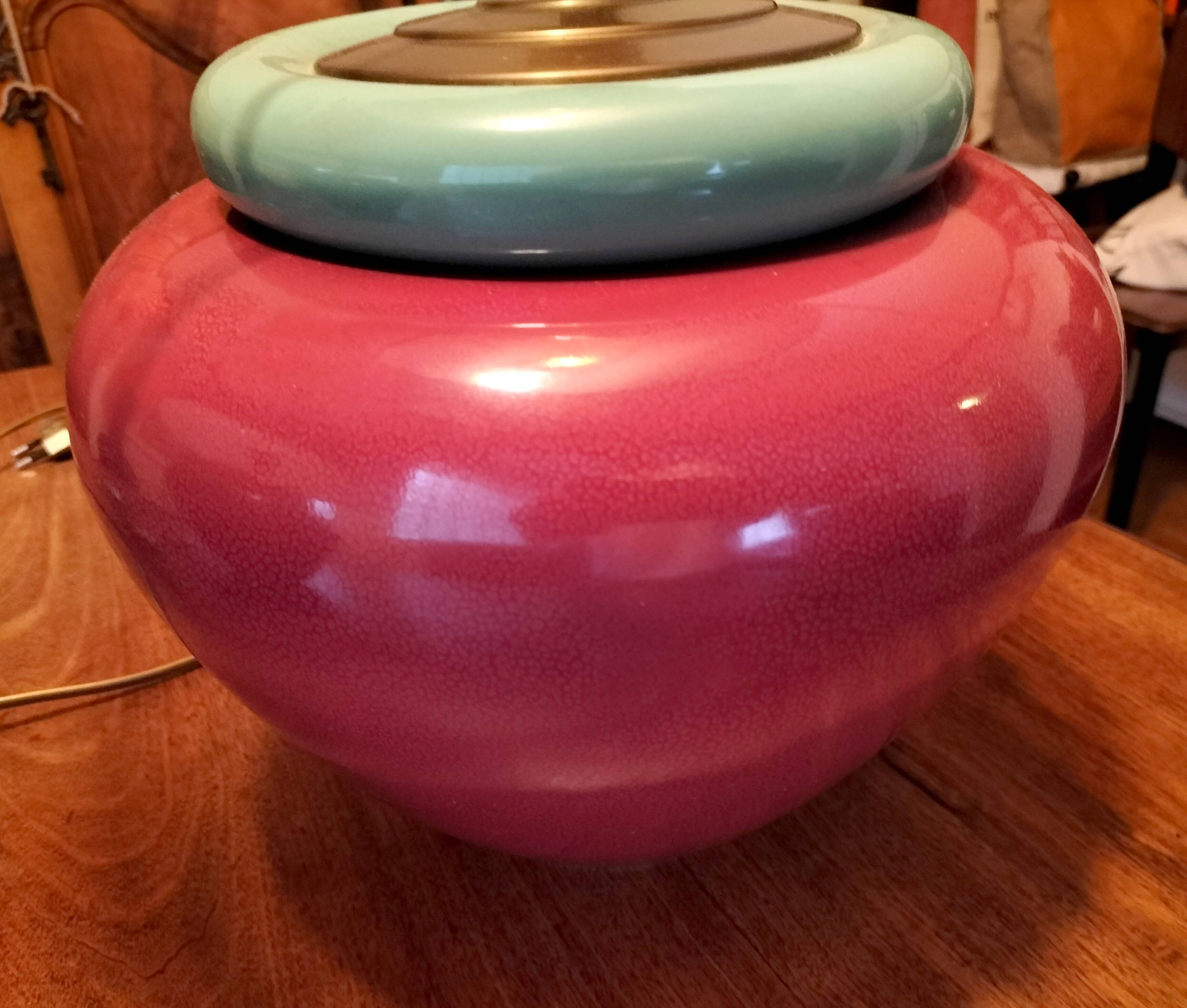 Inverted "mirror" pair of large red and green ceramic lamps.