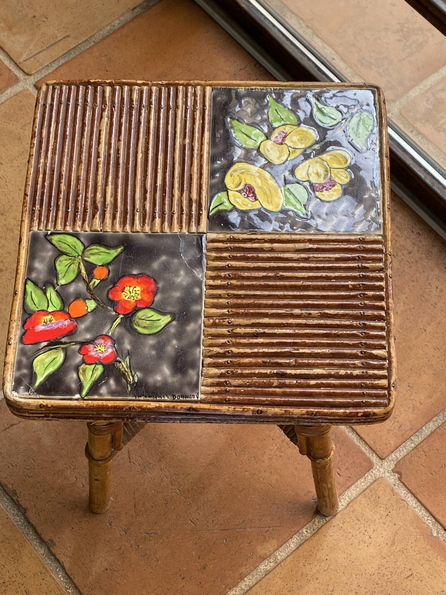 Rattan and ceramic coffee table attributed to Audoux and Minnet.