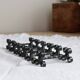 6 vintage black metal knife rests with scroll decorations
