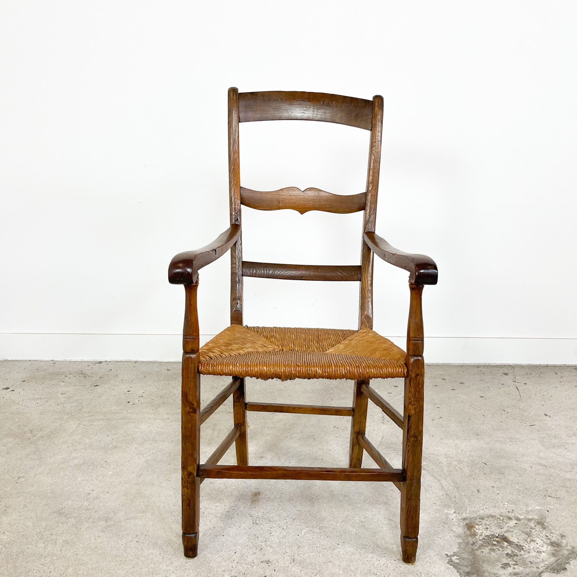 Antique oak armchair with cane seat 19th century
