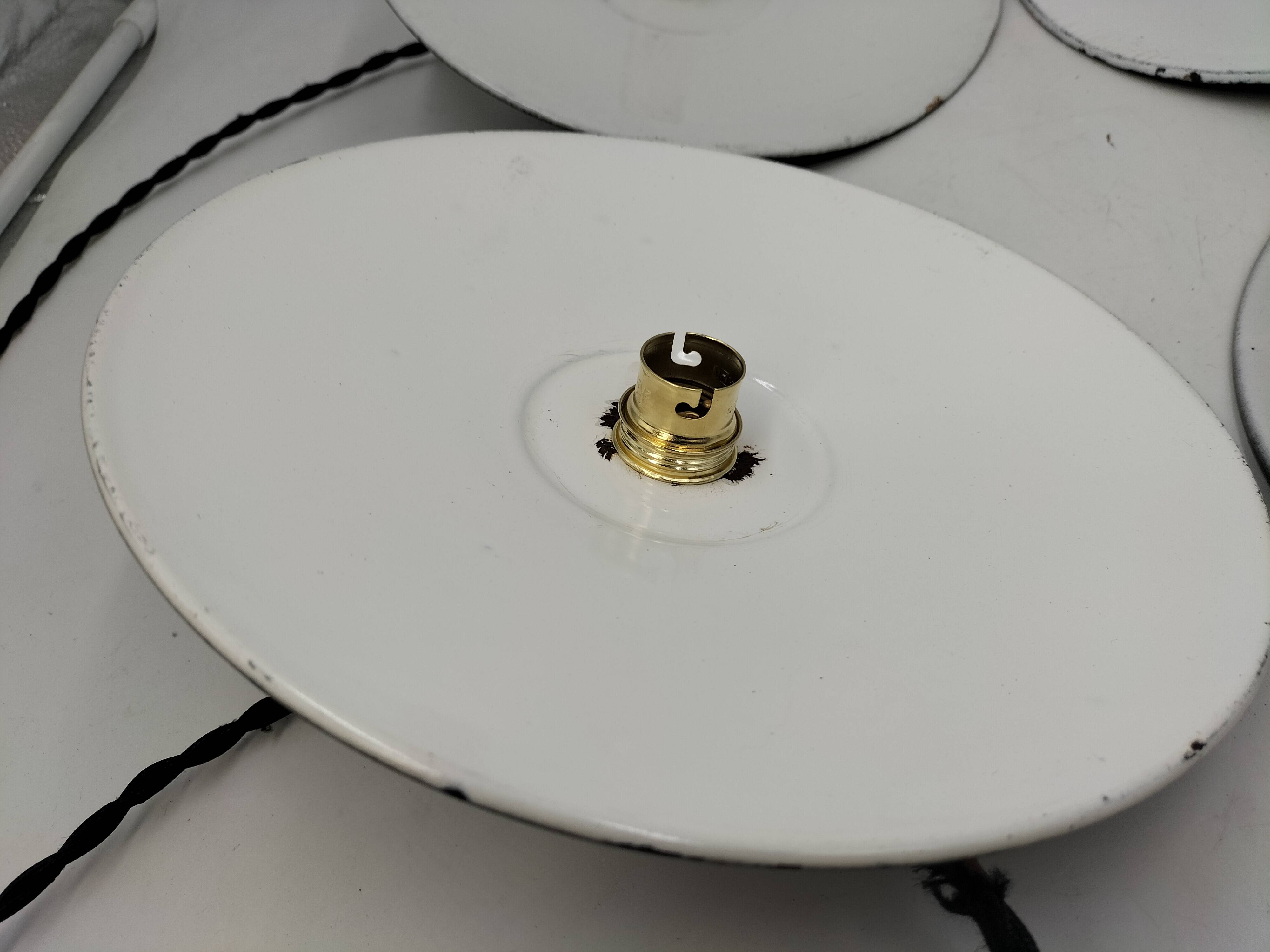 4 enameled sheet metal pendants